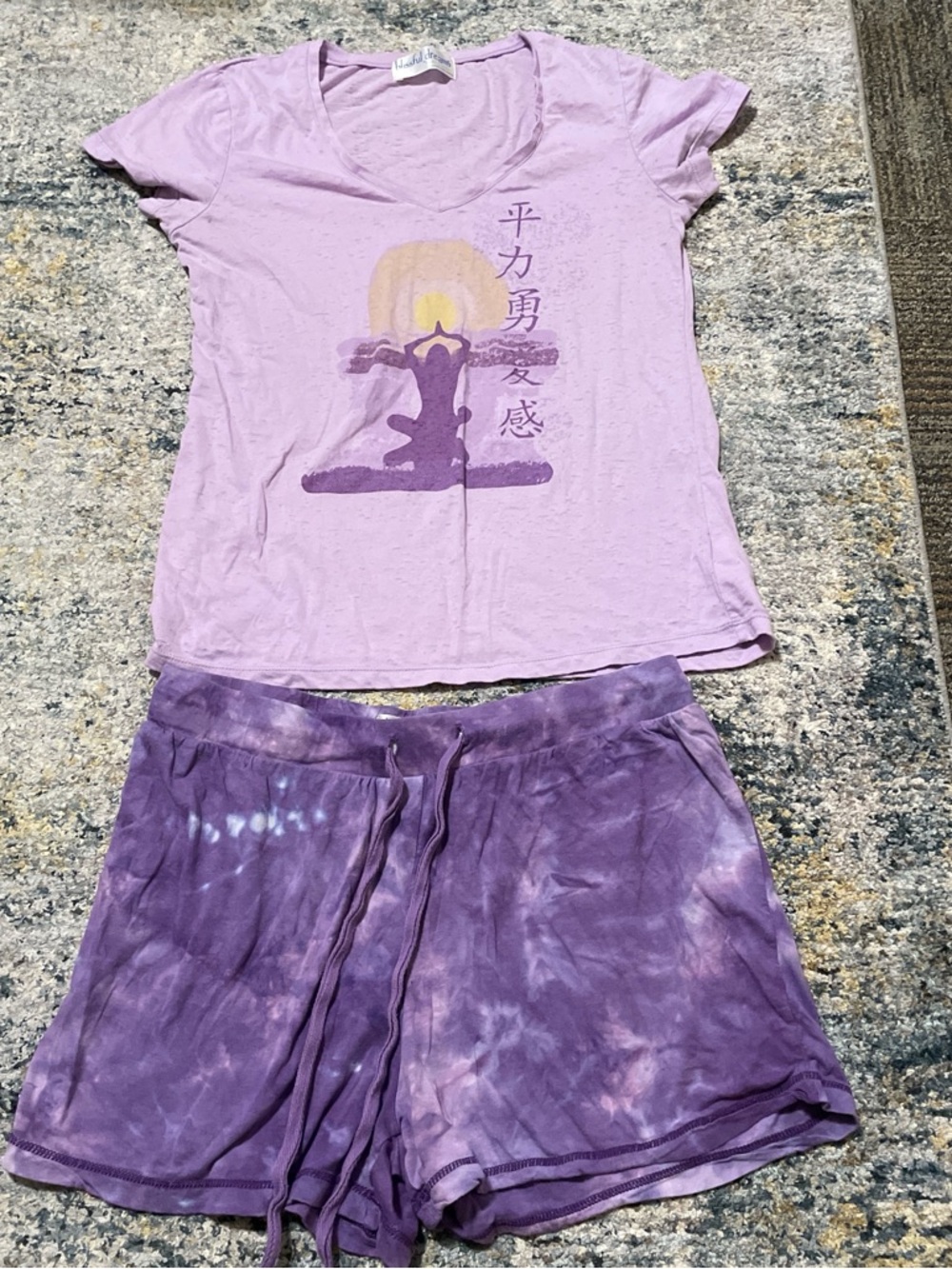 Women’s purple short sleeve pajama set with yoga design